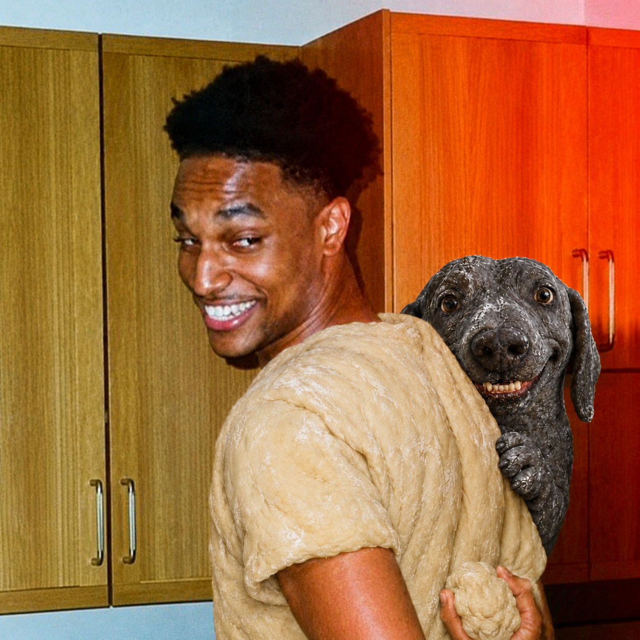 Ansem carrying a dark Dough Dog in a warm kitchen